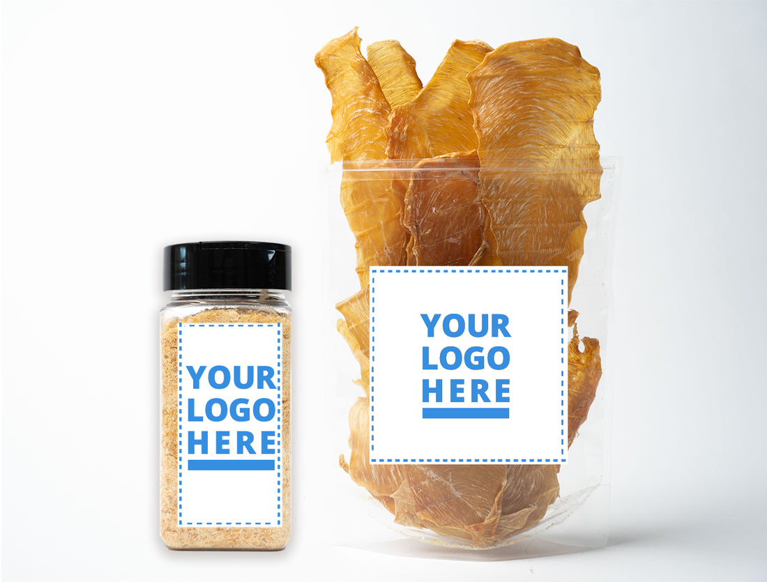 A clear plastic pouch filled with chicken jerky private label dog treats and a small plastic container of powdered treats, both featuring a “Your Logo Here” label, displayed against a white background.